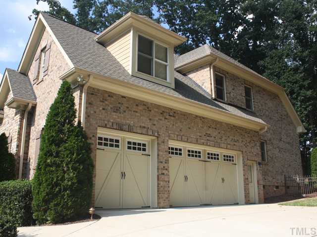 12816 River Dance Drive Raleigh, NC 27613 - Photo 3 of 25 You will appreciate the 3-car, side-load garage. Additional features of the garage include an epoxy painted floor and a pedestrian door to the outside.