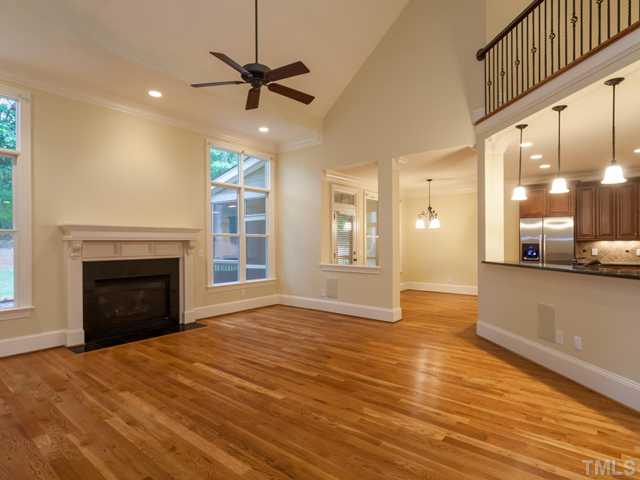 12816 River Dance Drive Raleigh, NC 27613 - Photo 7 of 25 As you enter the open family room you will be impressed with the vaulted ceiling and the floor to ceiling windows. Notice the open flow from the family room to the kitchen and breakfast room.