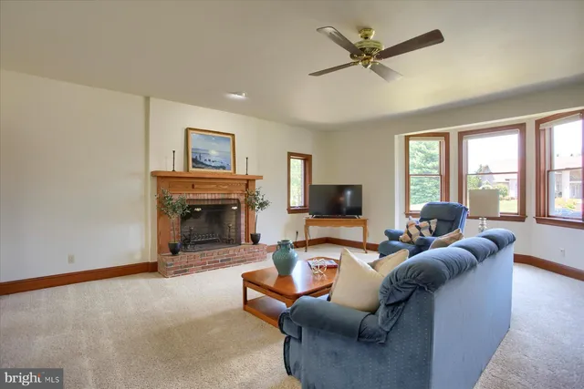 a en suite bathroom with a sink double vanity granite and a mirror