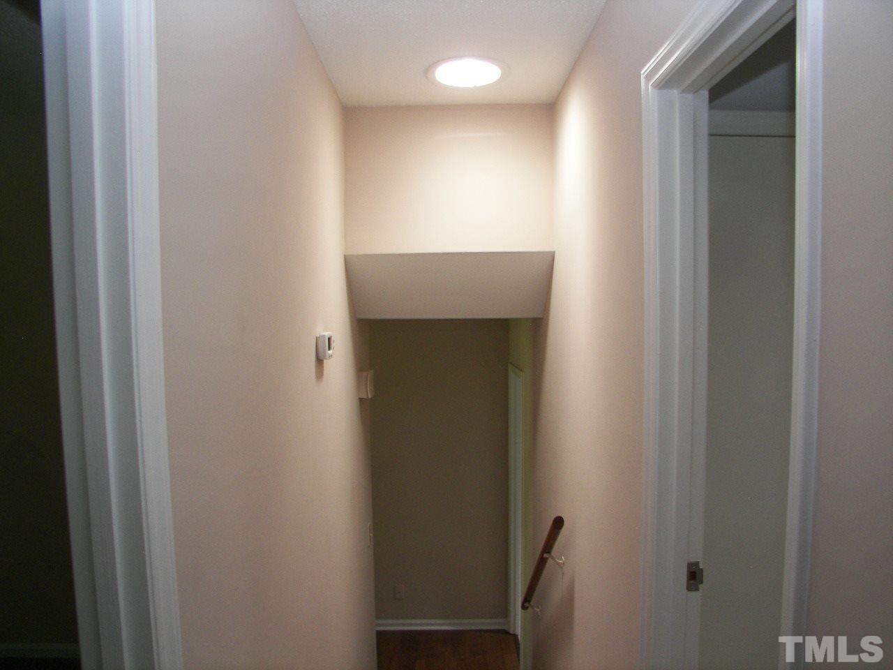 6729 Johnsdale Road Raleigh, NC 27615 - Photo 15 of 25 a view of elevator with wooden floor