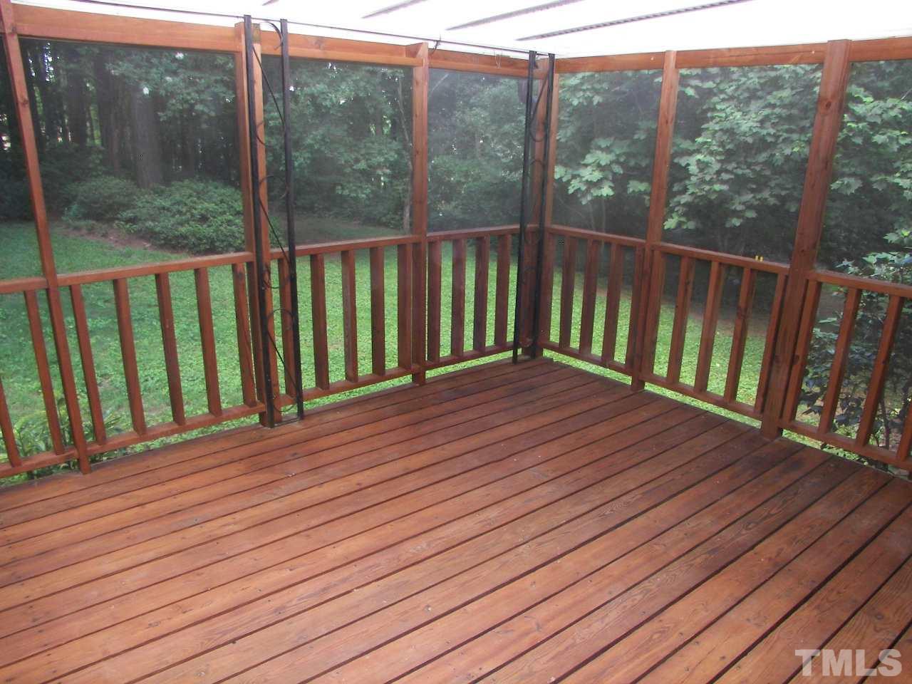 6729 Johnsdale Road Raleigh, NC 27615 - Photo 20 of 25 a view of a wooden deck