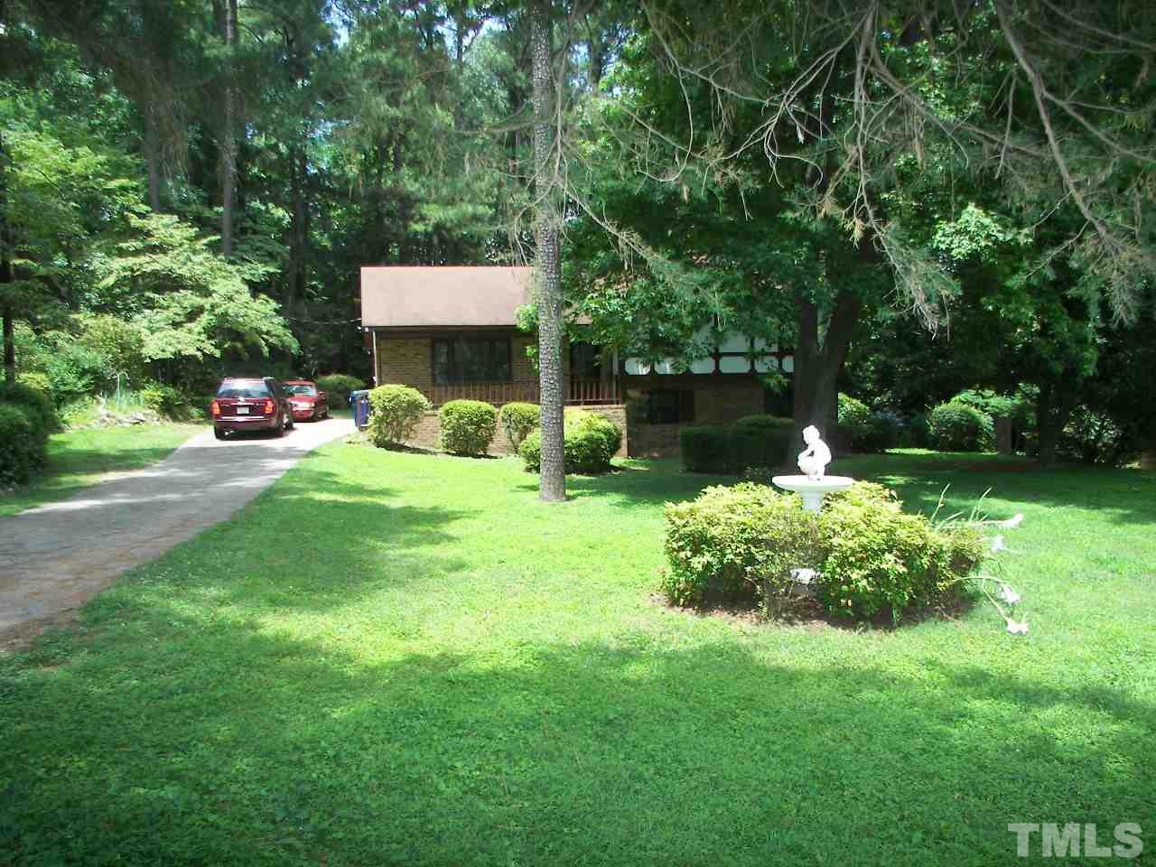 6729 Johnsdale Road Raleigh, NC 27615 - Photo 25 of 25 a backyard of a house with seating space