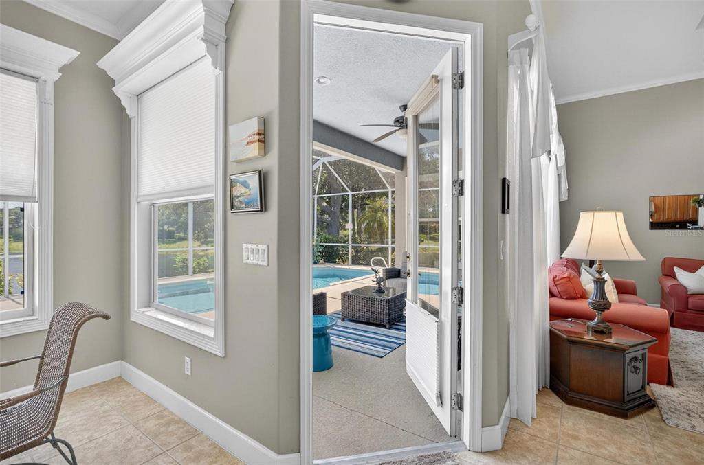 8 Hidden Lake Way Palm Coast, FL 32137 - Photo 16 of 46 a living room with furniture and a window
