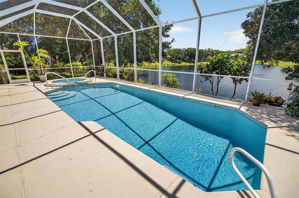8 Hidden Lake Way Palm Coast, FL 32137 - Photo 18 of 46 a view of a chairs and table in the roof