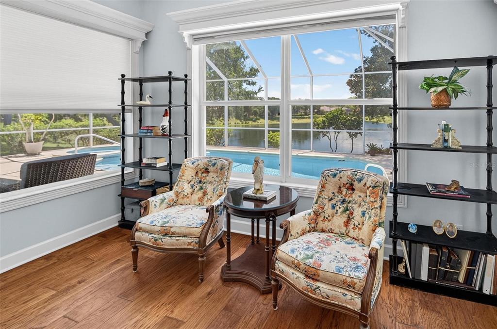 8 Hidden Lake Way Palm Coast, FL 32137 - Photo 30 of 46 a living room with furniture and a window