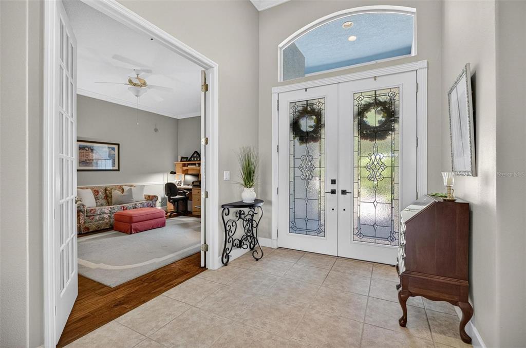 8 Hidden Lake Way Palm Coast, FL 32137 - Photo 32 of 46 a bedroom with furniture and a large window