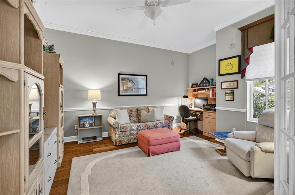 8 Hidden Lake Way Palm Coast, FL 32137 - Photo 33 of 46 a bedroom with a bed furniture and a window