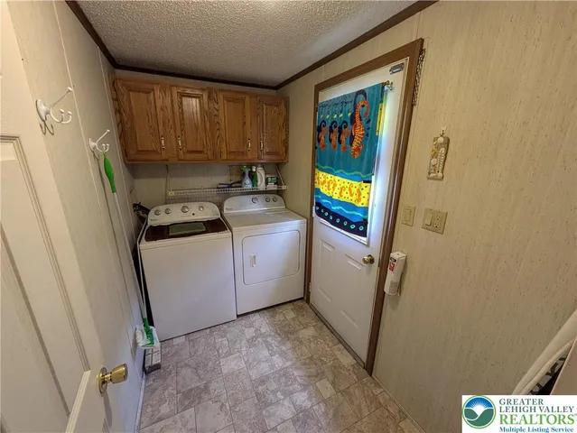 a view of utility room with washer and dryer