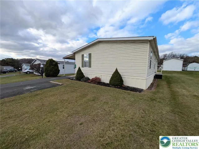 a view of backyard of house