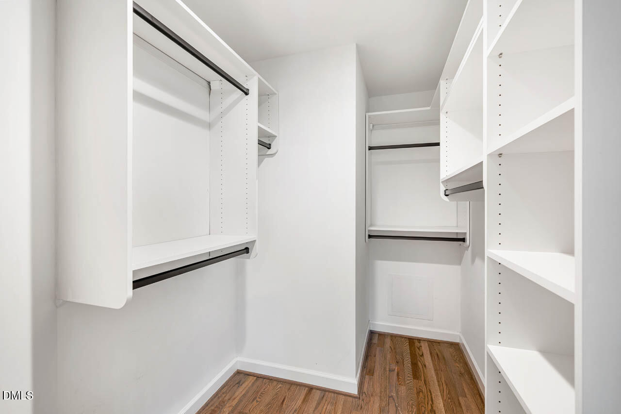 231 Flemington Road Chapel Hill, NC 27517 - Photo 22 of 48 a view of walk in closet with empty racks