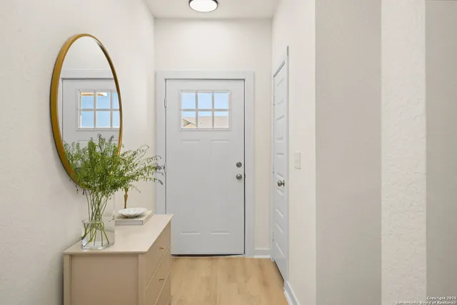 a view of a livingroom with a potted plant