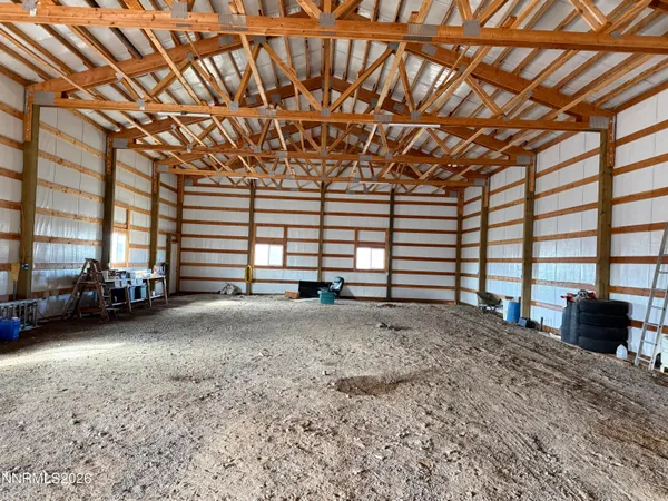 a view of a room with wooden walls