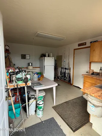 a view of a backyard of garage