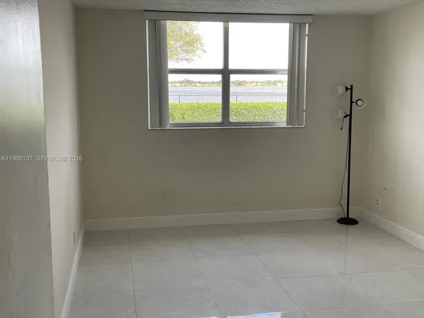 an empty room with a window