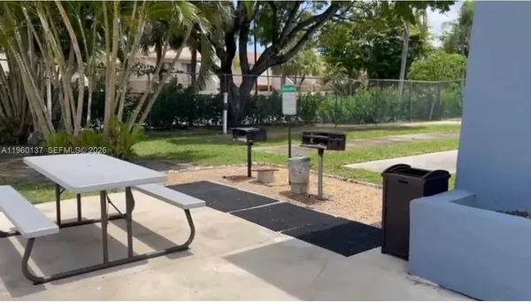 a view of a chairs with a backyard