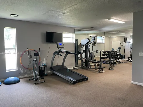 a view of a room with gym equipment