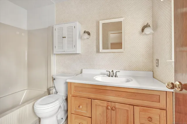 a picture of a book and a bed