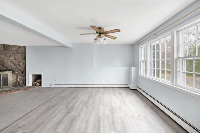 an empty room with windows