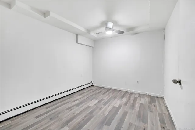 a bathroom with a sink vanity and a mirror