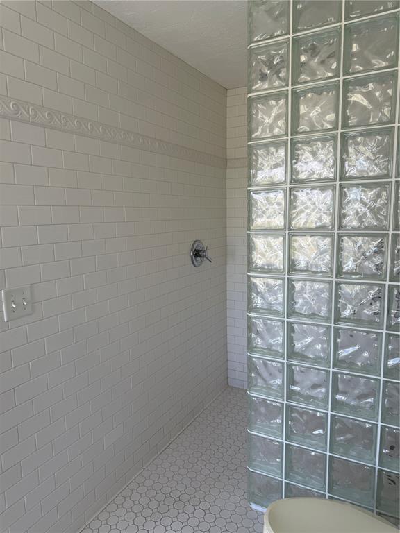 7390 South Mc Alpin Road McAlpin, FL 32062 - Photo 13 of 53 a bathroom with a shower