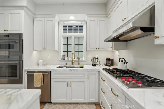 a bedroom with furniture and a flat screen tv