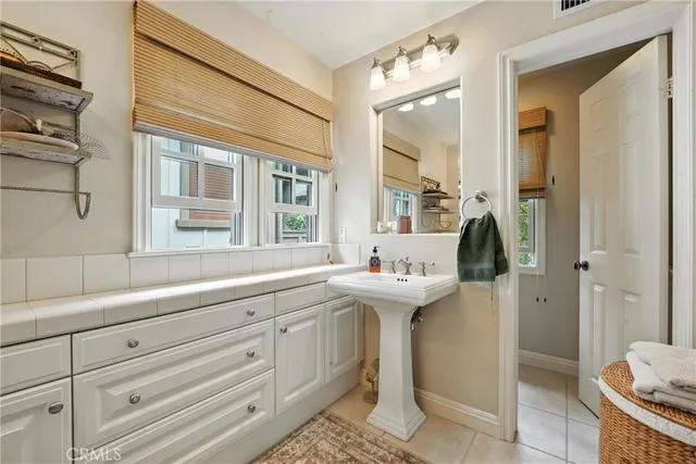 a spacious bedroom with a bed and walk in closet