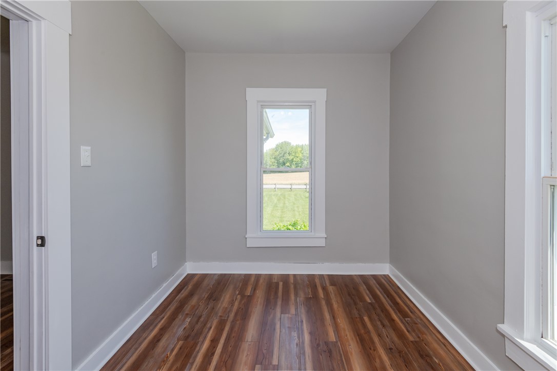 1217 Jasper Road Xenia, OH 45385 - Photo 34 of 62 Bright room with wood flooring and ample natural light, perfect for a home office or cozy reading nook.