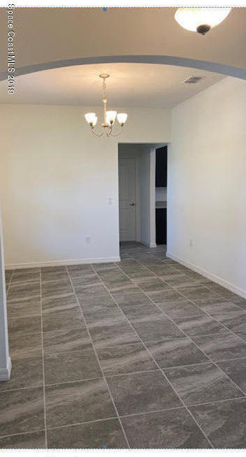 918 Raleigh Road Southeast Palm Bay, FL 32909 - Photo 3 of 13 Foyer