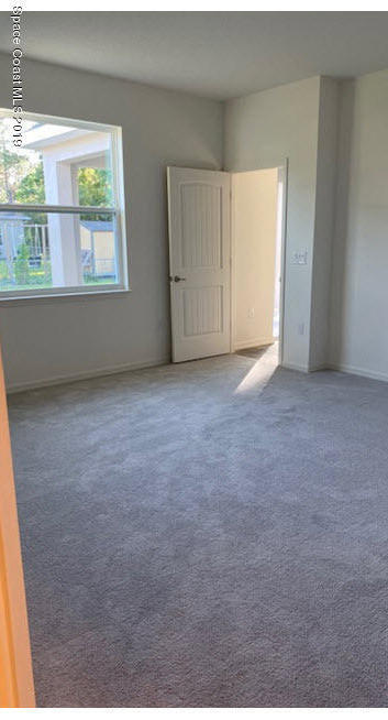 918 Raleigh Road Southeast Palm Bay, FL 32909 - Photo 7 of 13 Owners Suite