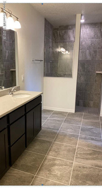 918 Raleigh Road Southeast Palm Bay, FL 32909 - Photo 9 of 13 Owners Suite Bath