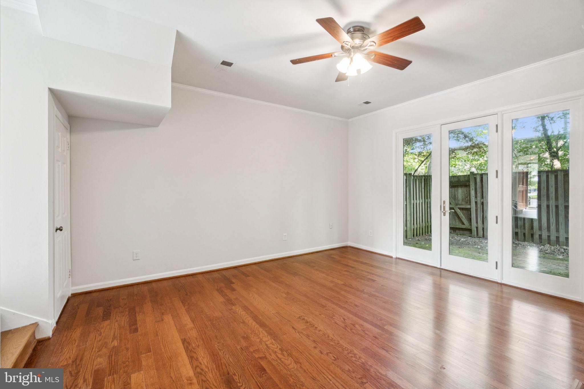 6711 Washington Boulevard, Unit C Arlington, VA 22205 - Photo 8 of 30 a view of an empty room with a window