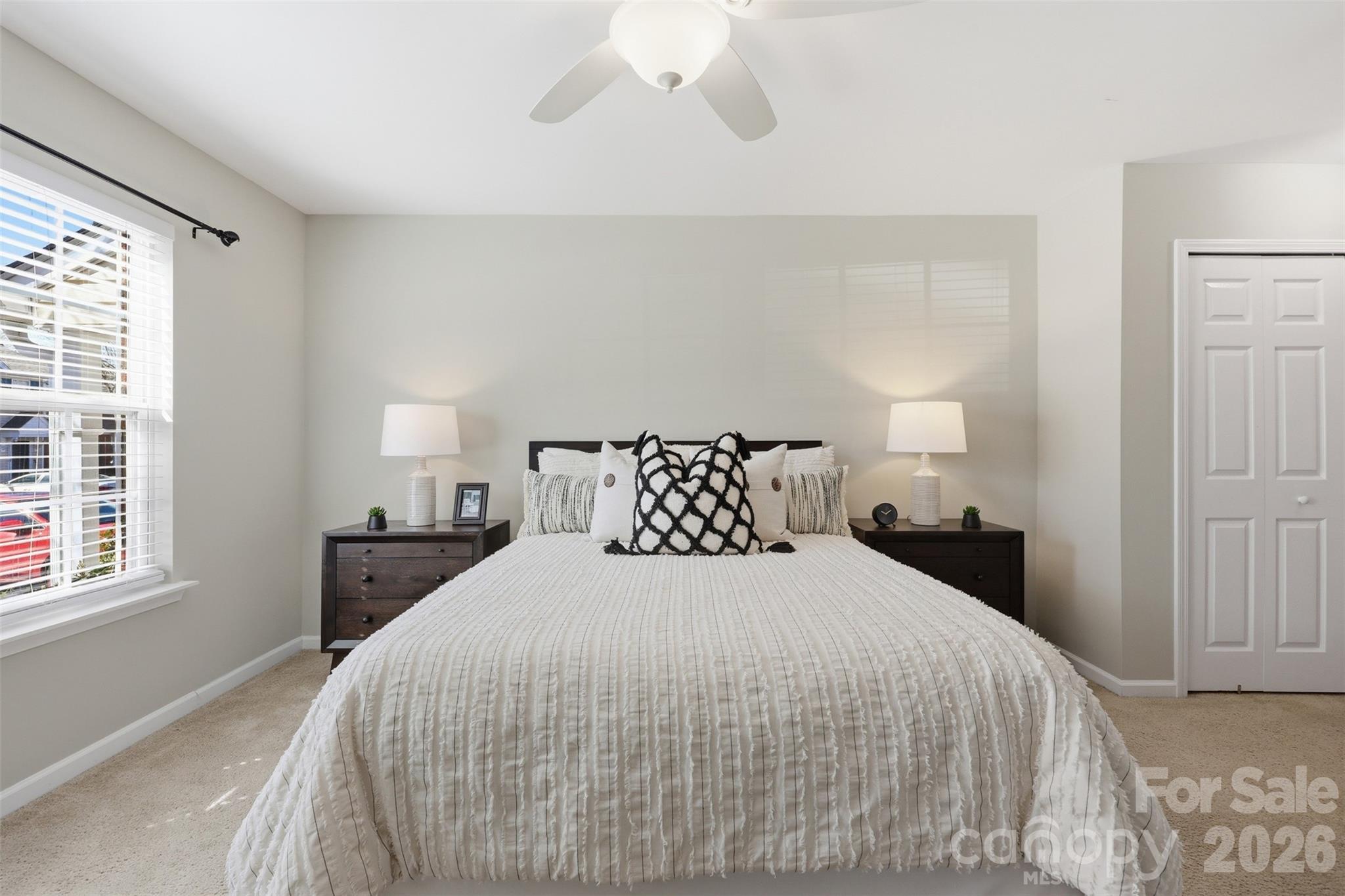 212 Primrose Walk Fort Mill, SC 29715 - Photo 14 of 37 a bedroom with a bed and a window