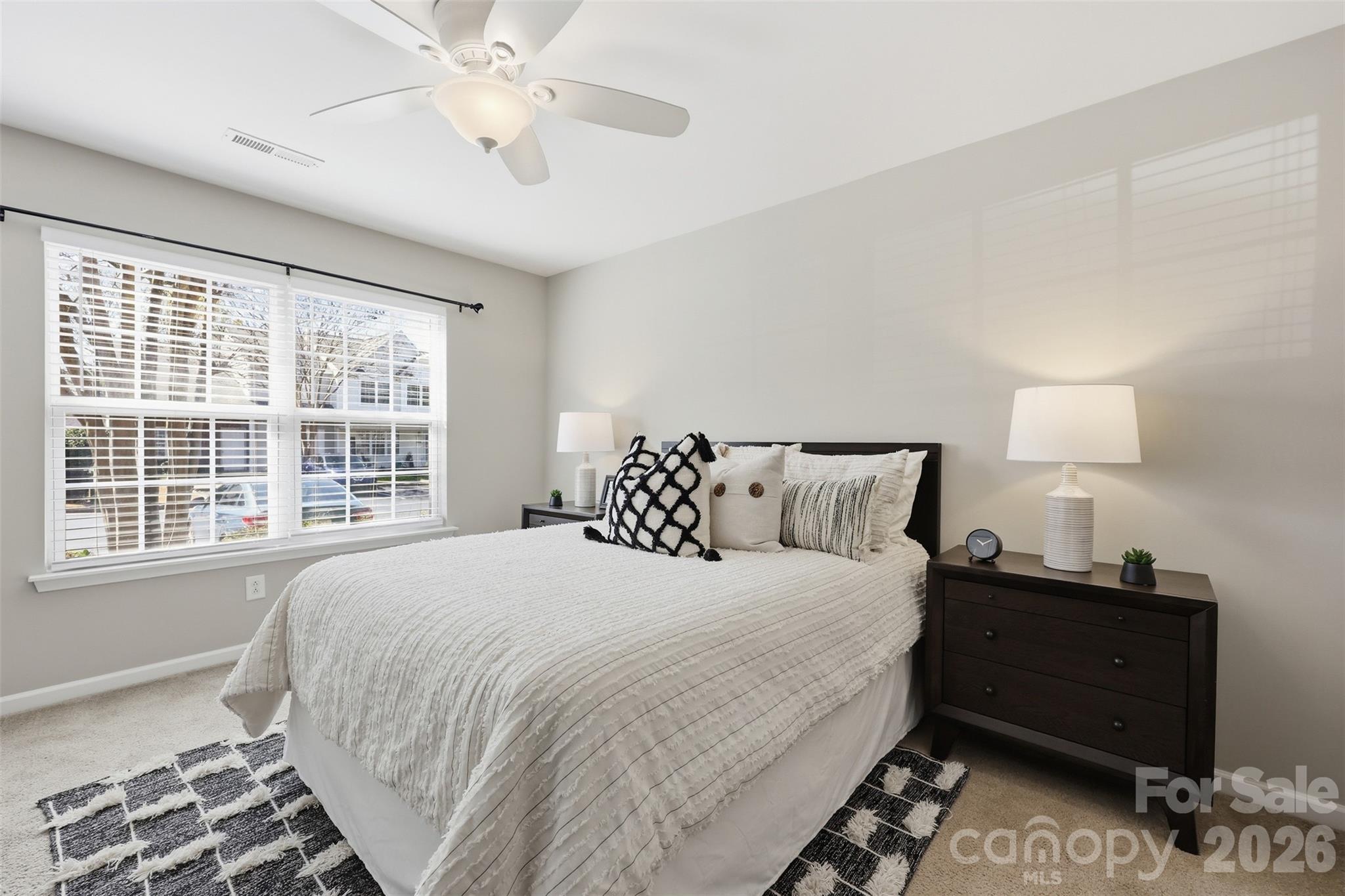 212 Primrose Walk Fort Mill, SC 29715 - Photo 15 of 37 a bedroom with bed and window