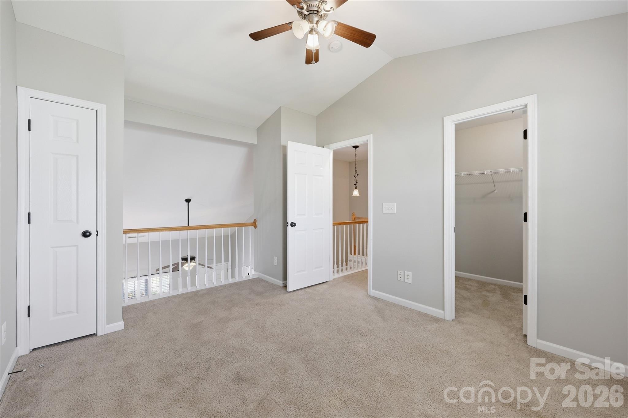 212 Primrose Walk Fort Mill, SC 29715 - Photo 20 of 37 a view of a livingroom with a chandelier fan