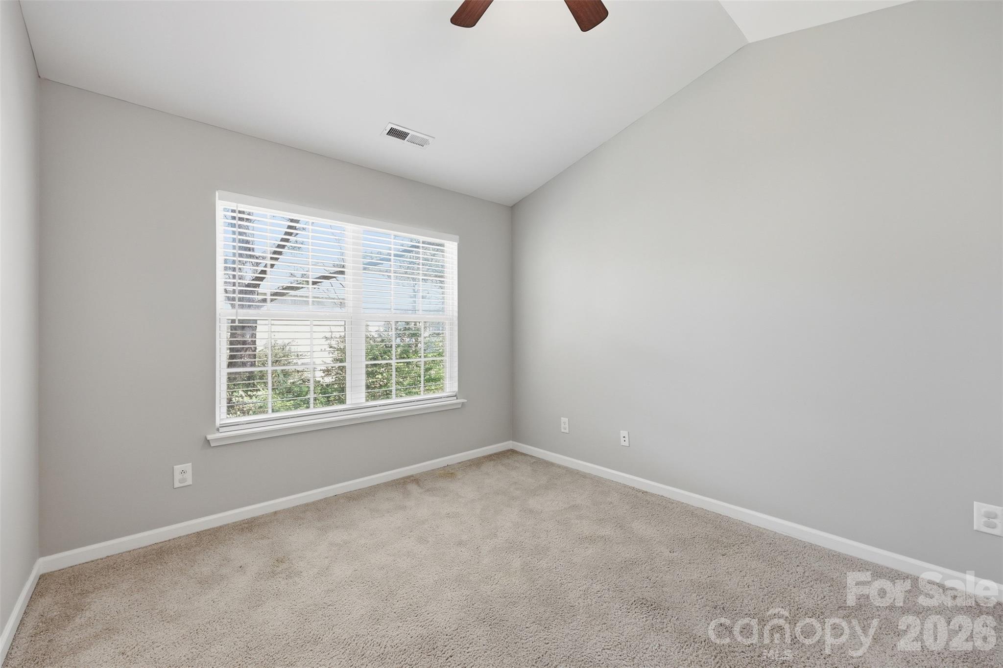 212 Primrose Walk Fort Mill, SC 29715 - Photo 23 of 37 an empty room with a window