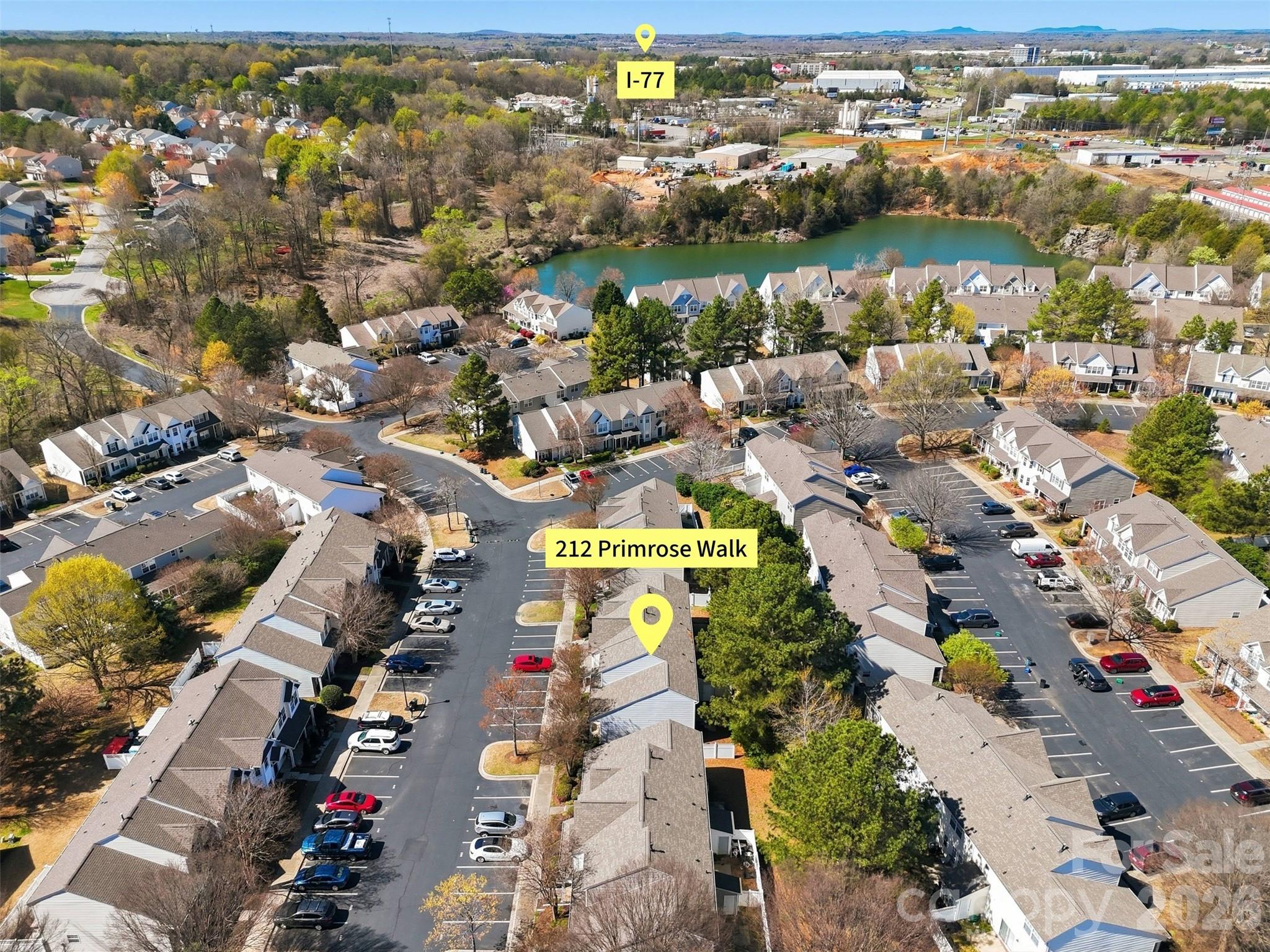 212 Primrose Walk Fort Mill, SC 29715 - Photo 32 of 37 an aerial view of residential building and lake