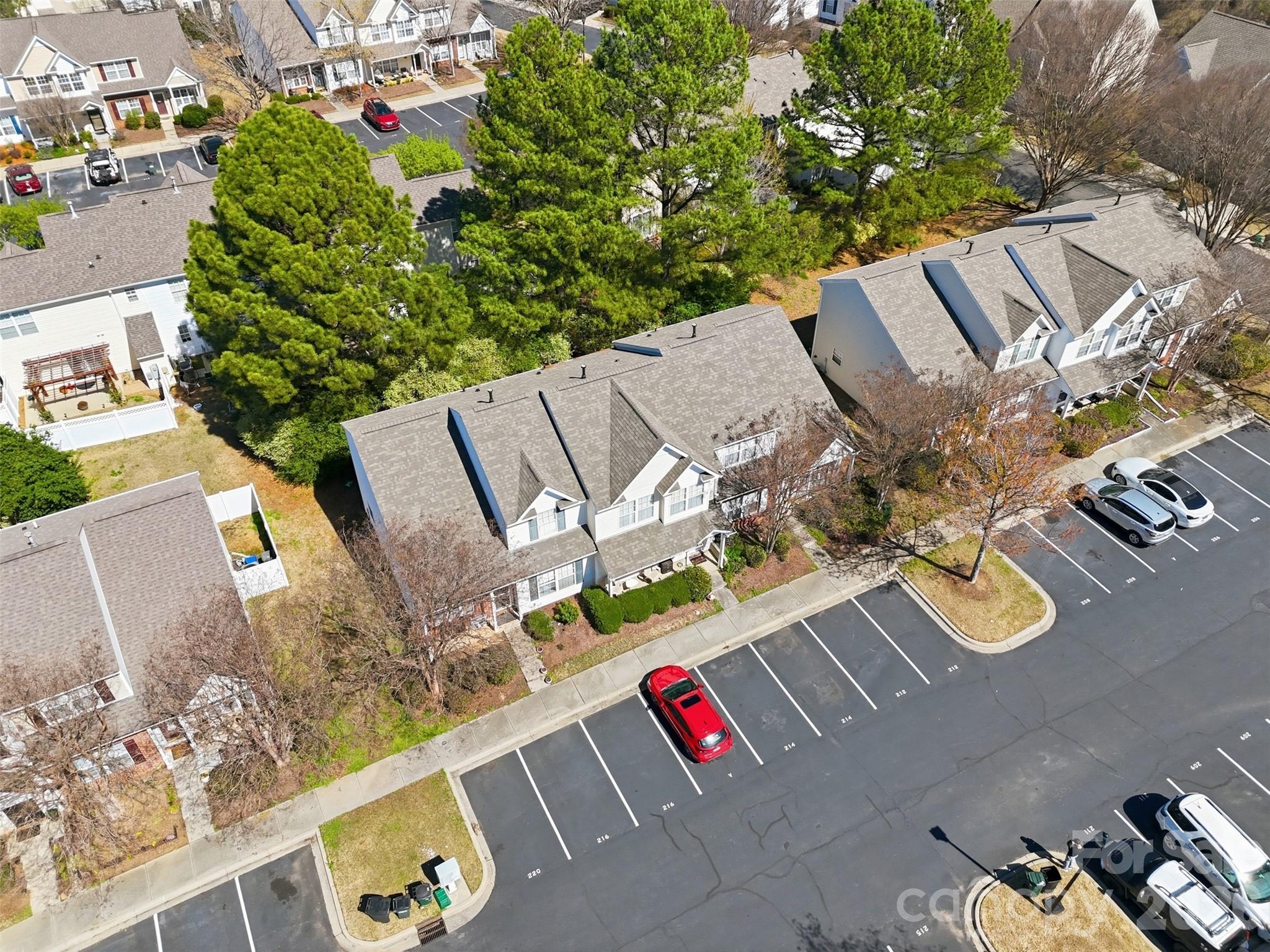 212 Primrose Walk Fort Mill, SC 29715 - Photo 36 of 37 an aerial view of a house with a yard and garden