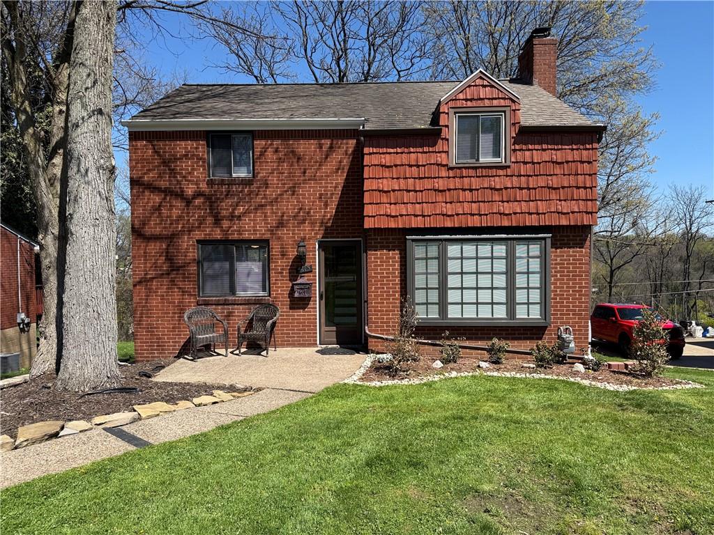 5113 Azalea Drive Pittsburgh, PA 15236 - Photo 1 of 26 a front view of a house with a yard