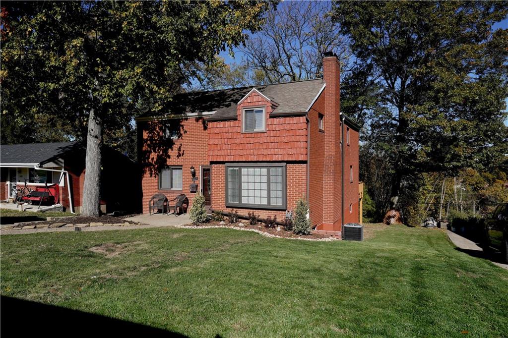 5113 Azalea Drive Pittsburgh, PA 15236 - Photo 25 of 26 a front view of a house with a yard