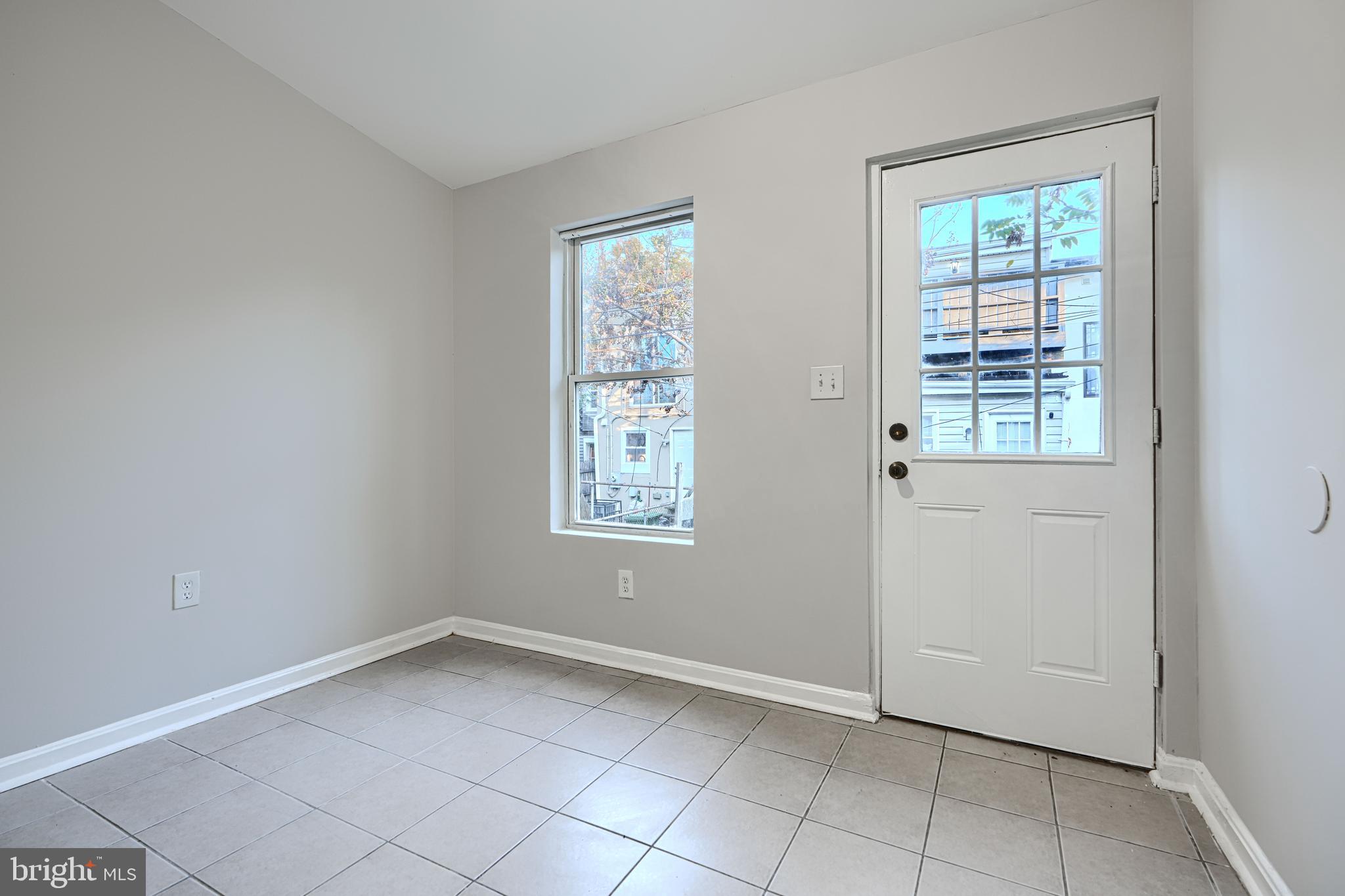 1127 Sargeant Street Baltimore, MD 21223 - Photo 13 of 30 an empty room with windows