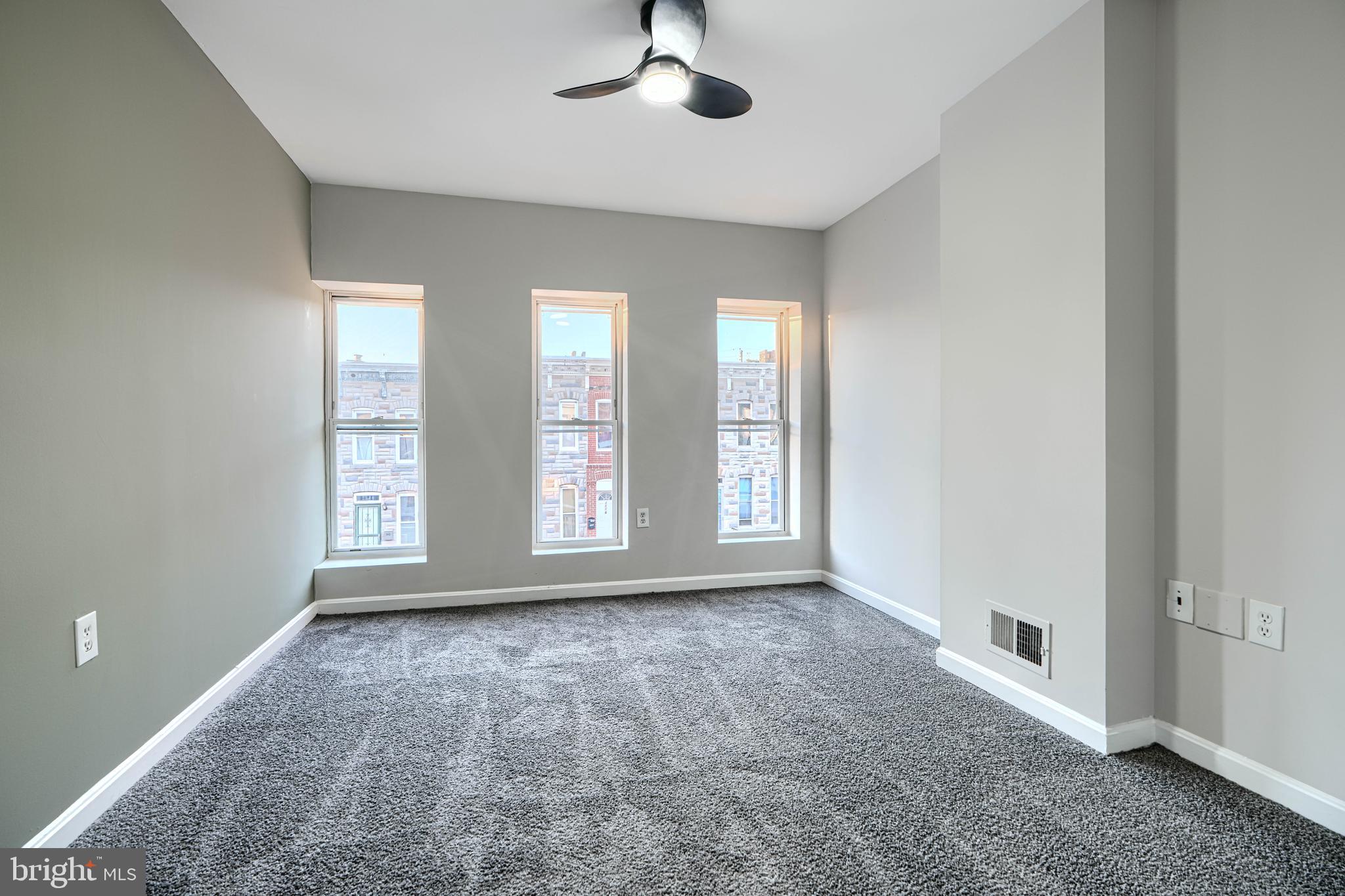 1127 Sargeant Street Baltimore, MD 21223 - Photo 16 of 30 a view of an empty room with a window