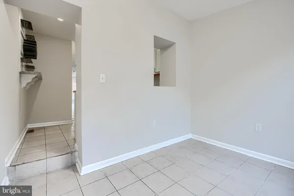 an empty room with white door