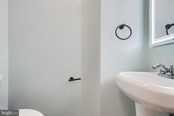 a bathroom with a sink and a toilet