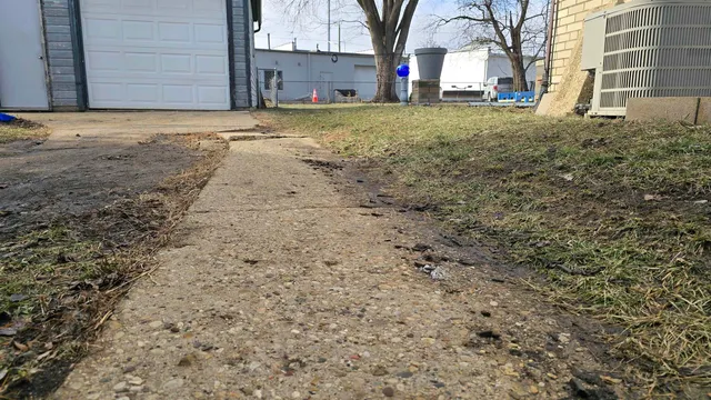 a view of a yard with a house