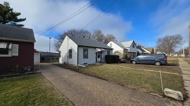 a house view with a backyard space