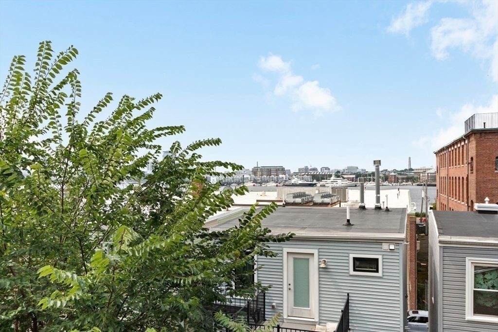 296 Meridian Street, Unit 2 Boston, MA 02128 - Photo 8 of 11 a picture of city view