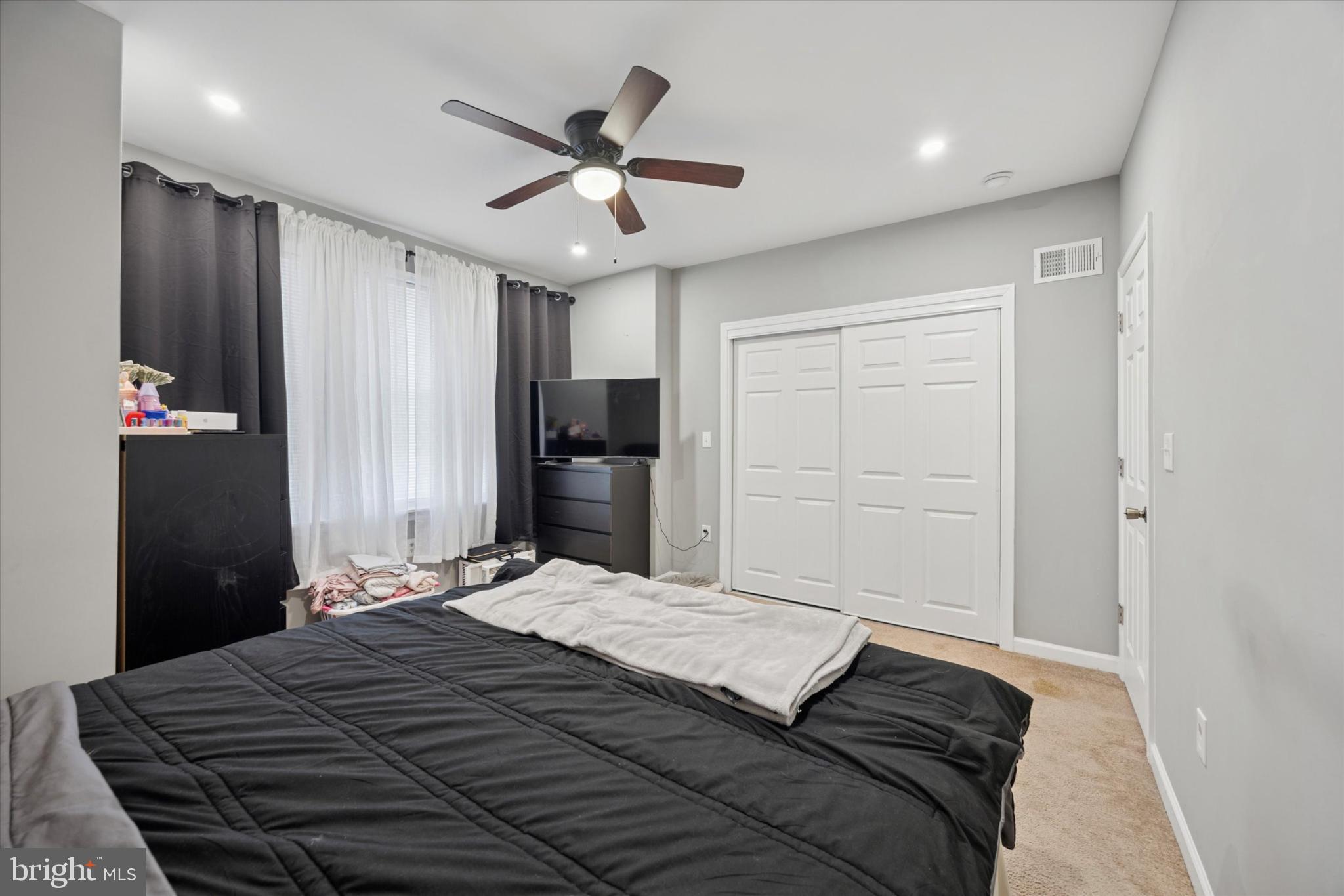 1210 Atwood Road Philadelphia, PA 19151 - Photo 21 of 25 Cozy bedroom with modern touches and light.