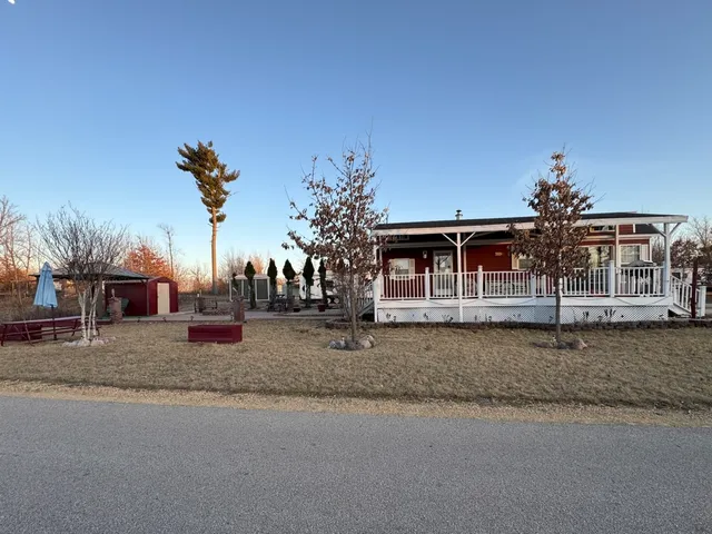 a front view of a house with a porch