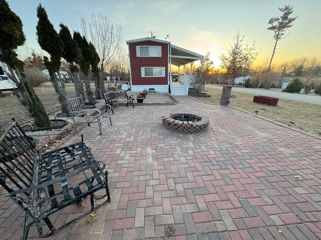 a outdoor space with lots of white furniture