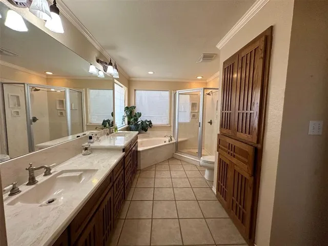 a bathroom with a sink a mirror and a shower